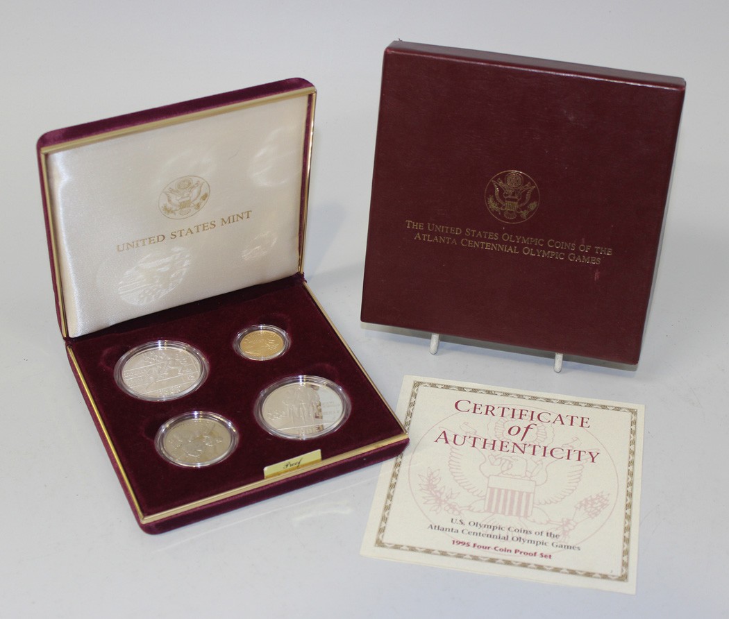 A USA four coin proof set commemorating The Atlanta Centennial Olympic Games 1995, comprising gold