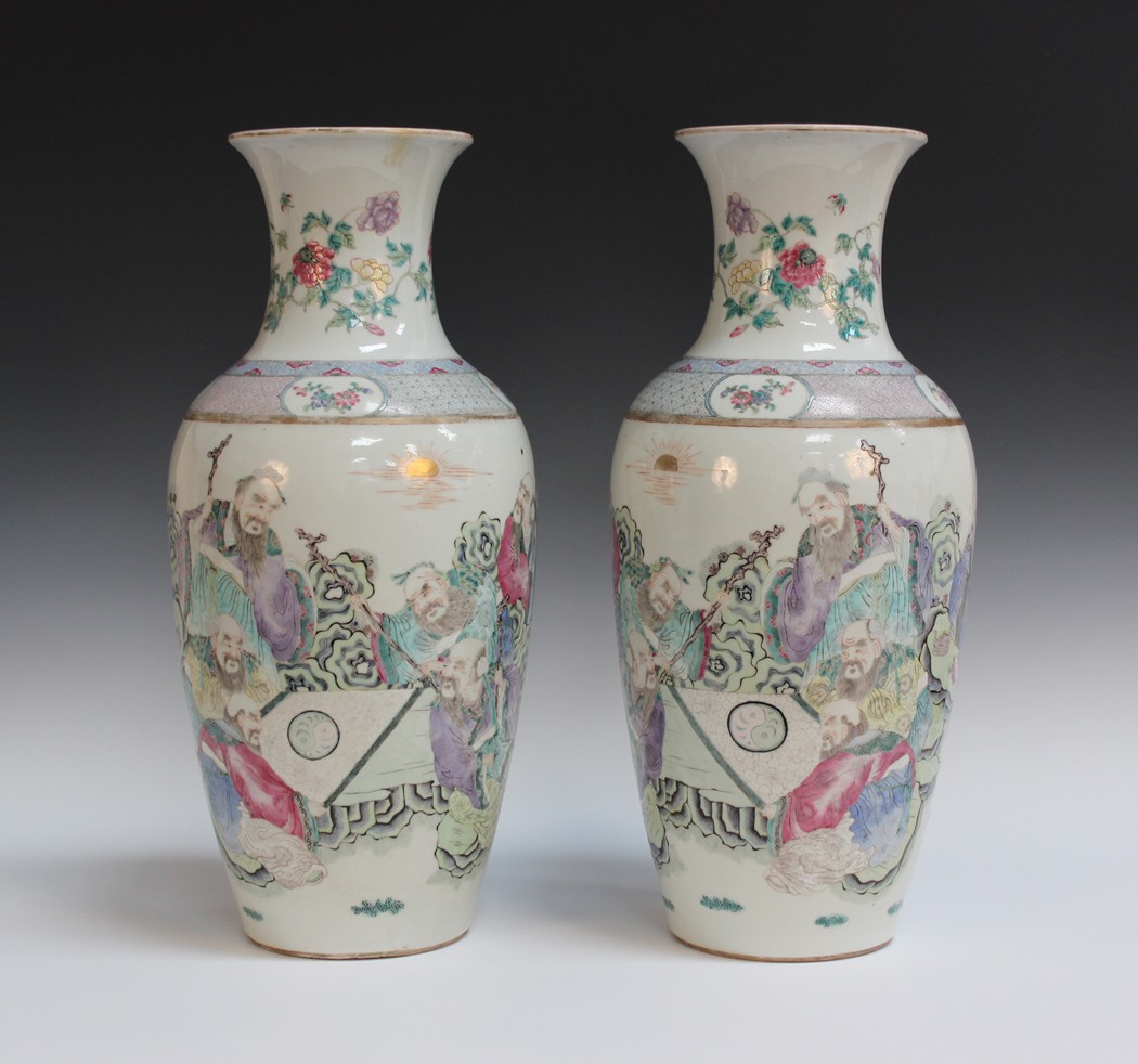 A pair of Chinese famille rose porcelain vases, late 19th Century, each elongated ovoid body