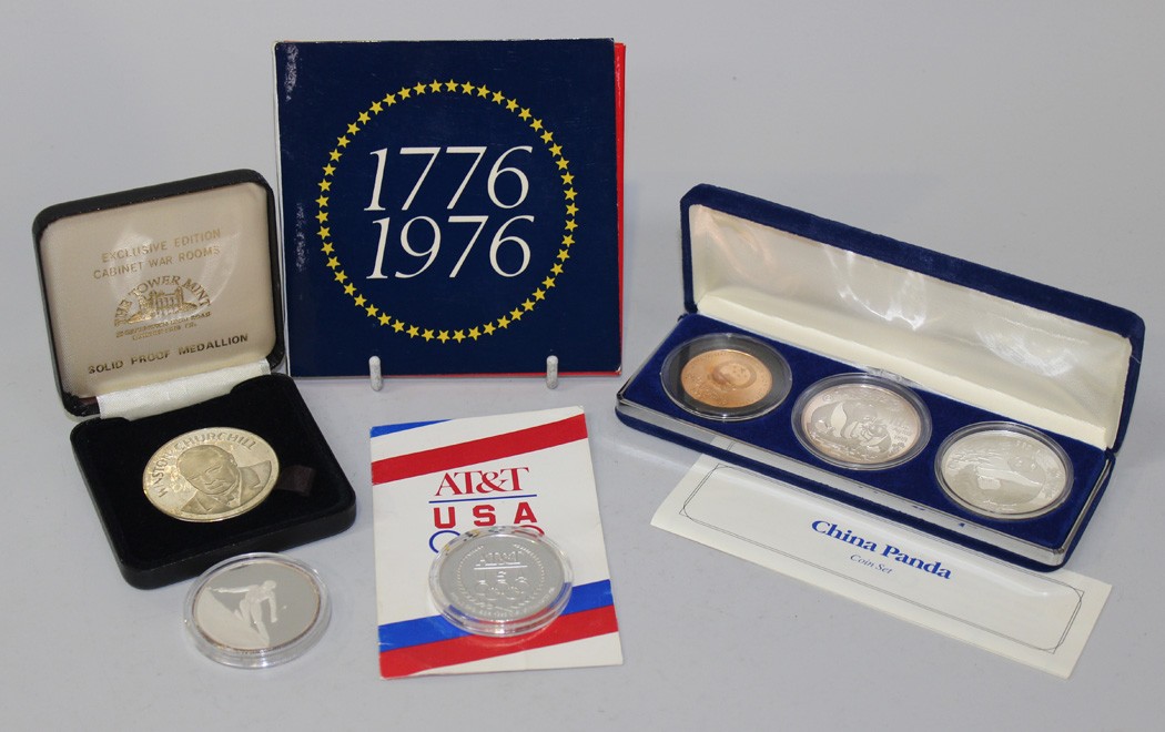 Two USA AT&T silver Olympic commemorative medallions 1992, a bronzed medallion commemorating 200