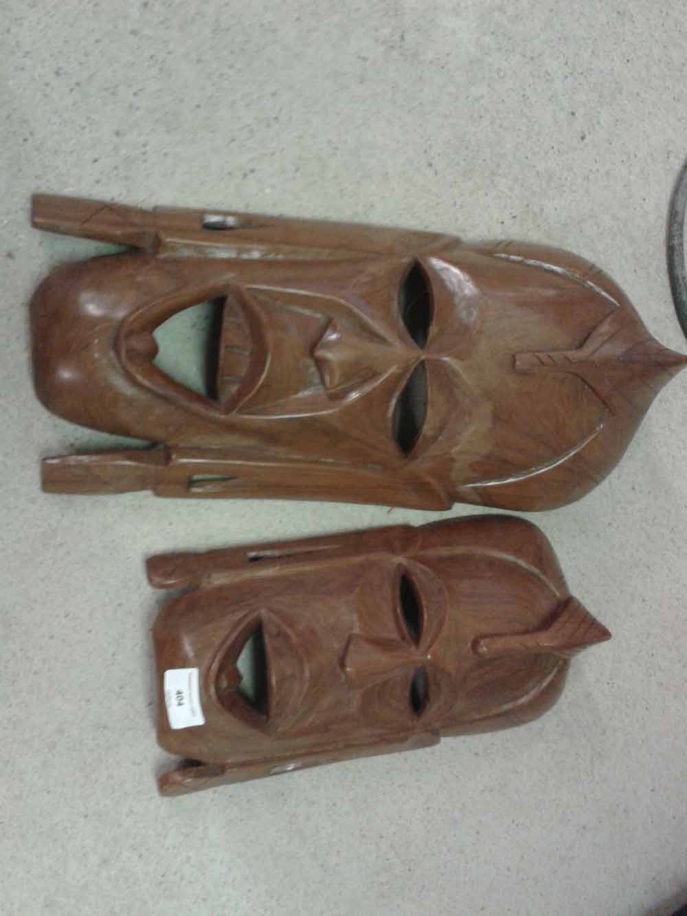 2 African carved wooden tribal masks