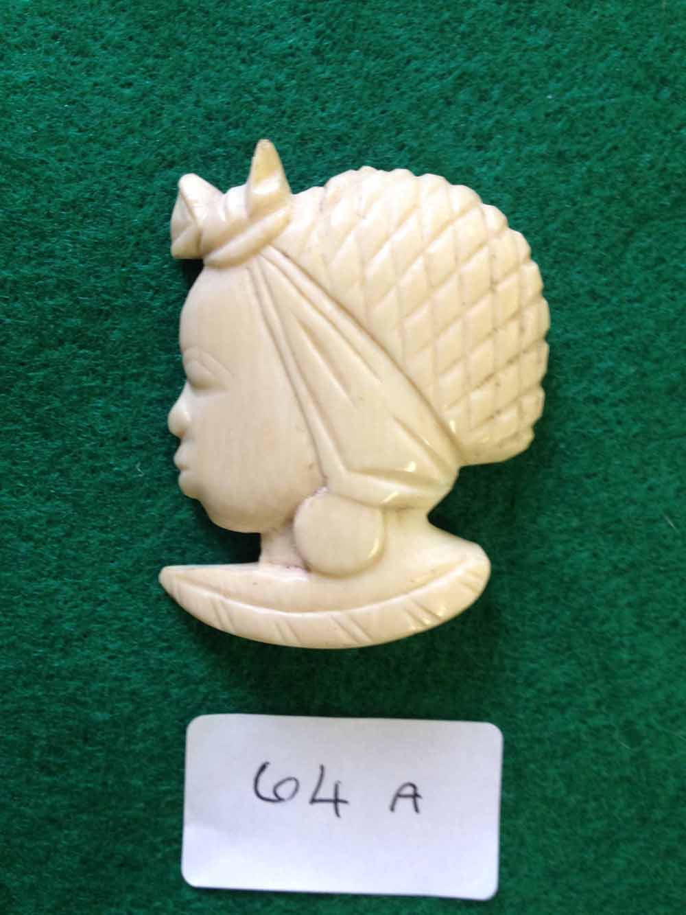 An Ivory brooch in the form of an African ladies head ~ c1930`s