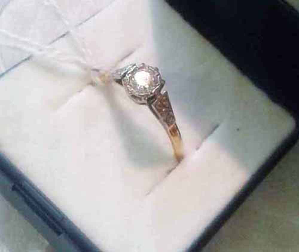 18ct gold platinum set single stone old cut diamond ring in an illusion set mount with fancy