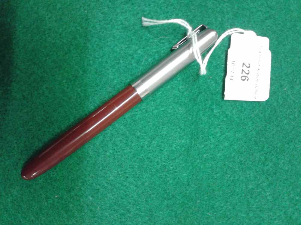 Waterman`s 513 foutain pen c1950s. Burgundy celluloid with brushed chrome cap and chrome trim. Clear