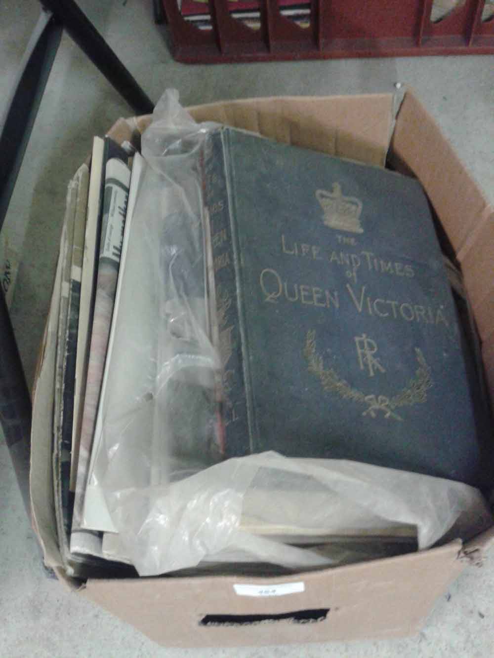 A box of vintage books.