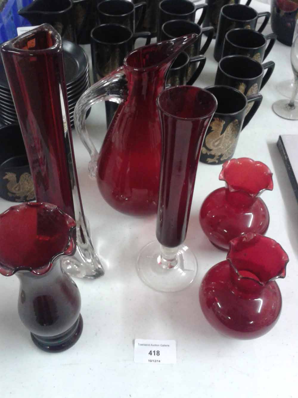 A collection of Ruby glassware to include Murano jug and vase