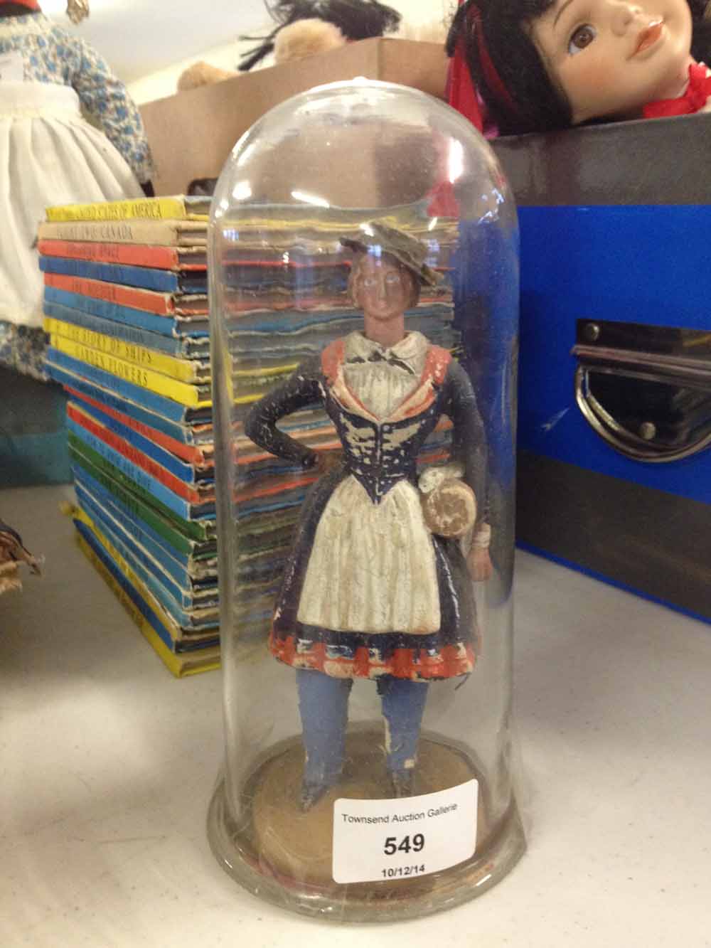 Victorian nodding doll in glass dome of a Crimean War French CantiniÞre. Approx 6" tall.