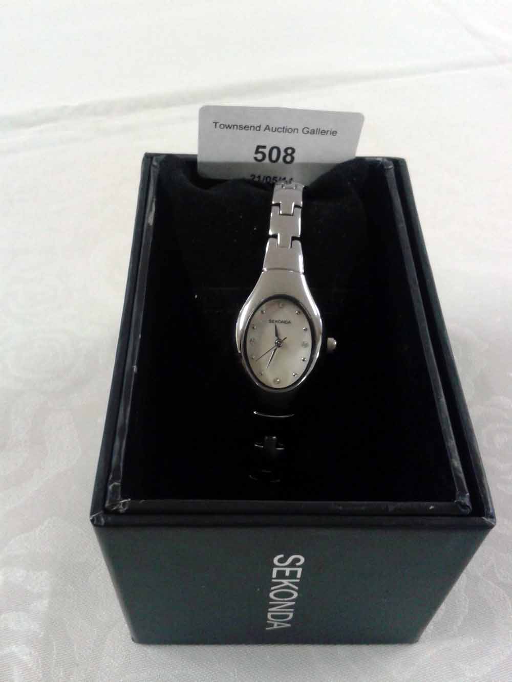 Boxed ladies Sekonda watch with oval mother of pearl face, stainless steel bracelet, 4151 AHT.