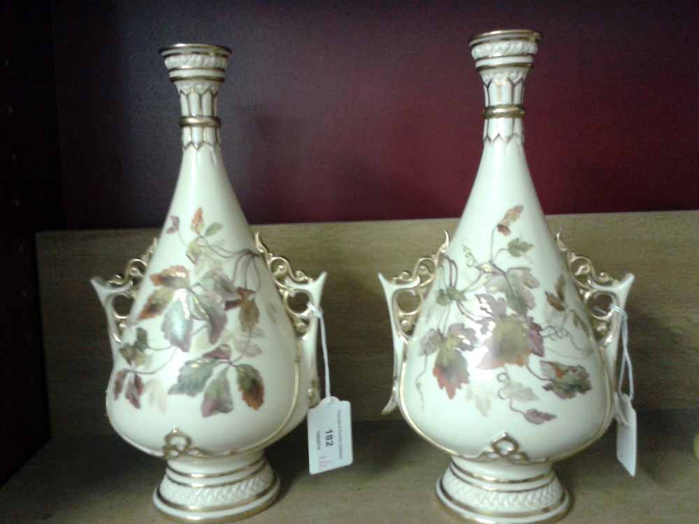 A pair of Royal Worcester blush ivory vases with Ivy leaf decoration