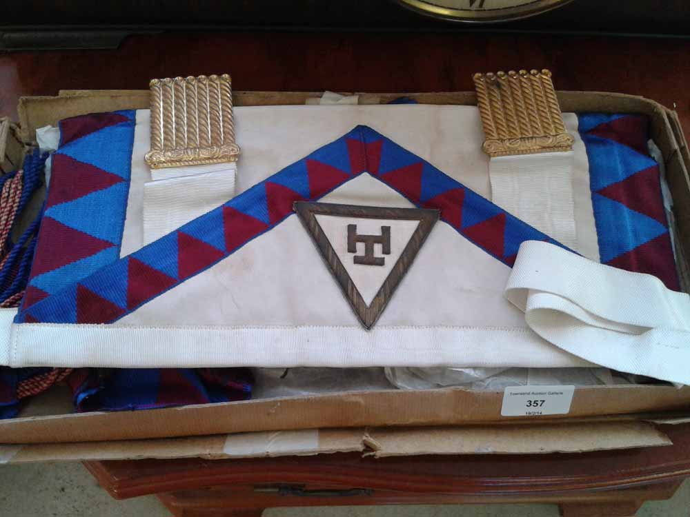 An old Masonic sheepskin apron and sash in it`s original Spencers Masonic Manufactory postage box -