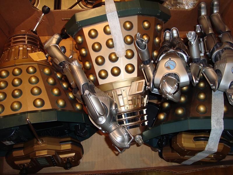 A group of modern Dr Who toys to include three Daleks all with R/C transmitters and three Cybermen