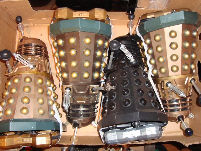 A group of modern radio control Dalek toys all with R/C transmitters.


Condition 3
Box condition