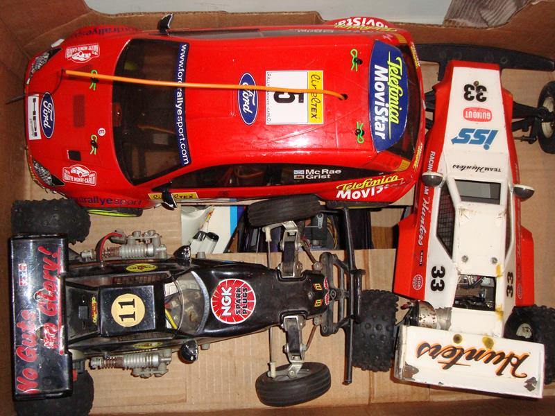 A group of radio control (r/c) cars for spares or repair as lotted.

Condition 3/5
Box condition