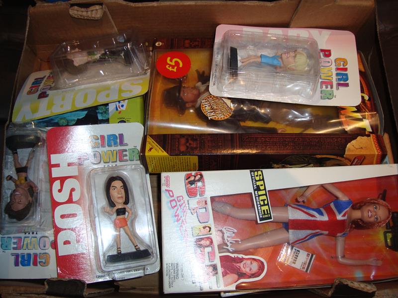 A quantity of boxed action figures to include Indiana Jones and Spice Girls and others.

Condition