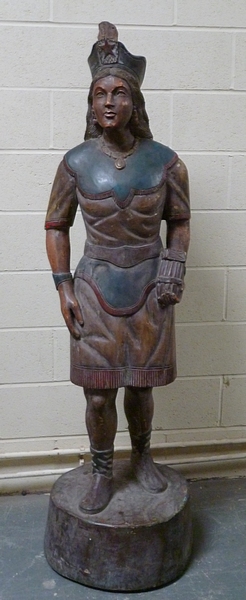 A late 18c/early 19c tobacco/cigar store figure, carved and painted in the form of a North American