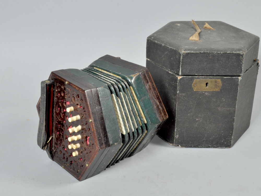 An early 20c twenty key Anglo system concertina by Burton of Westminster Bridge, London and