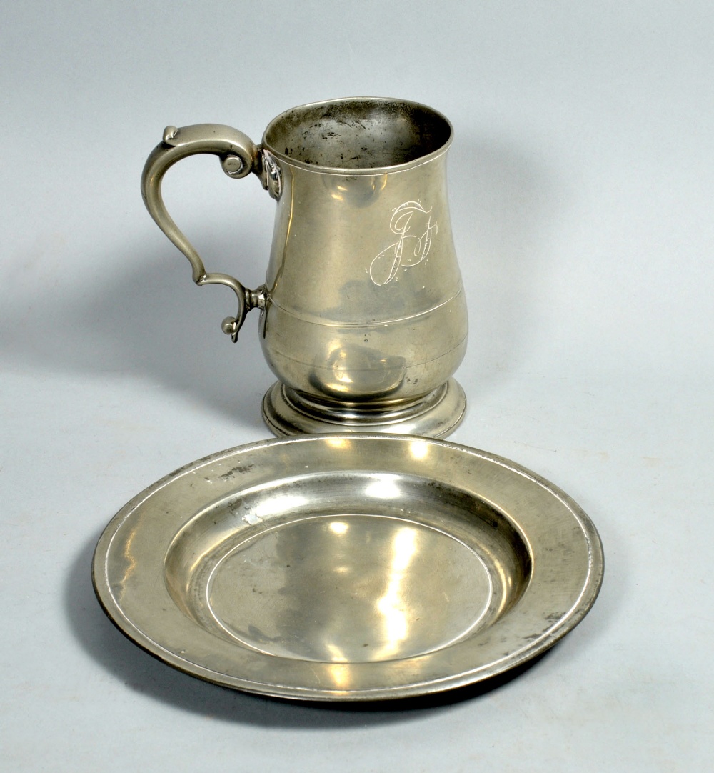 An early 19c English pewter dish with London touch marks, 10""diam, together with a one quart