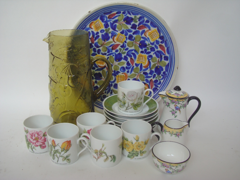 A French tin glazed faience dish, and a Hutschenreuther six setting German coffee set, printed