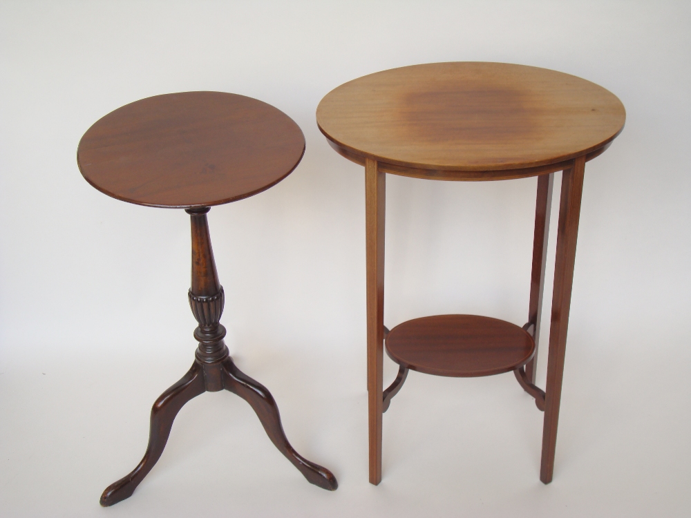 An Edwardian mahogany oval two tiered occasional table and a mahogany wine table (2).