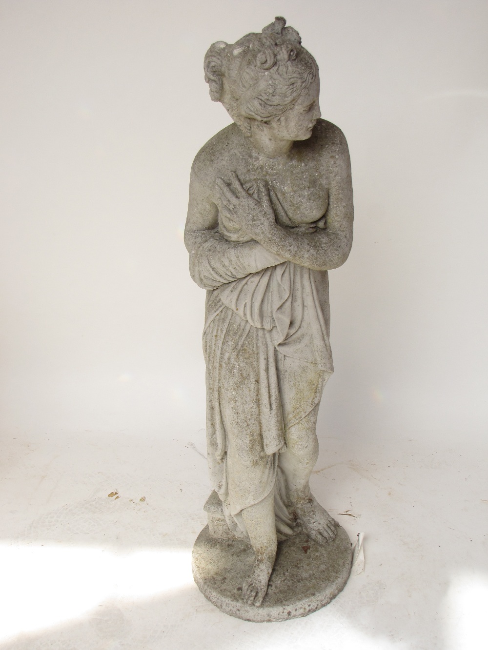 After the antique, a reconstituted figure of a semi-clad goddess, 116cm h.