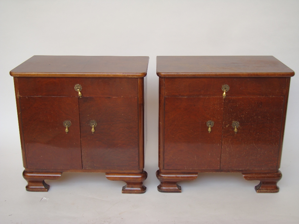 A pair of 1920's bedside cabinets.