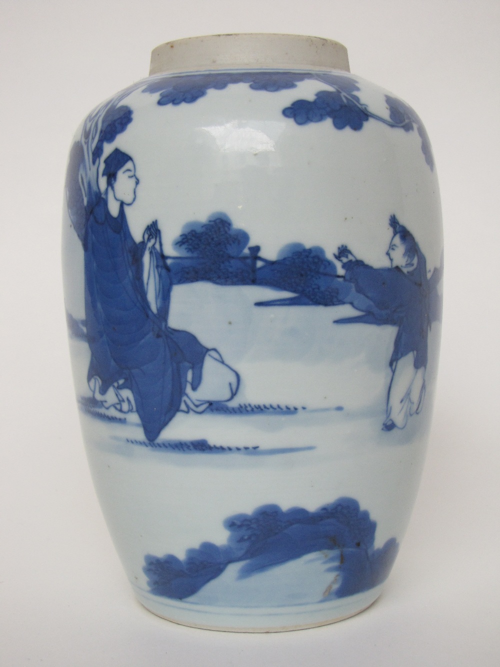 A Chinese blue and white porcelain ovoid jar, the body painted with seated scholar and pupil in