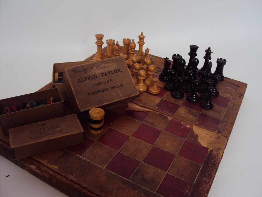 A 19th Century Staunton ebony and boxwood chess set, red crown mark, some old damages and losses