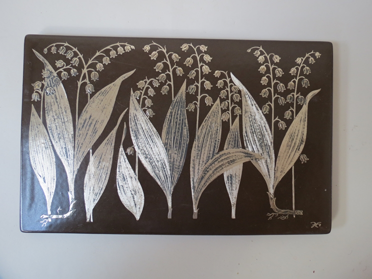 A Gustavsberg ceramic wall plaque, silvered "Lily of the valley" design