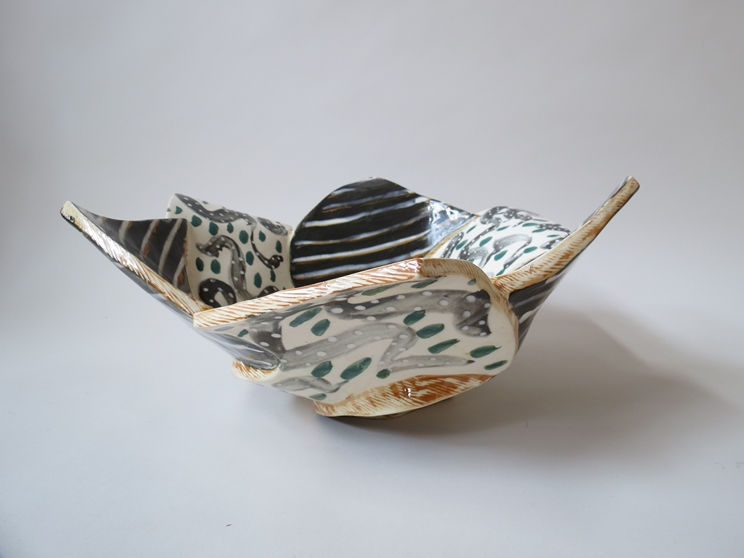 CAROL McNICOLL (b.1943) A slab built bowl with painted design under clear slip glaze. Painted mark