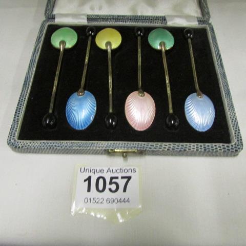 A set of 6 silver gilt coffee spoons with coffee bean ends and enamelled backs by Walker and Hall,