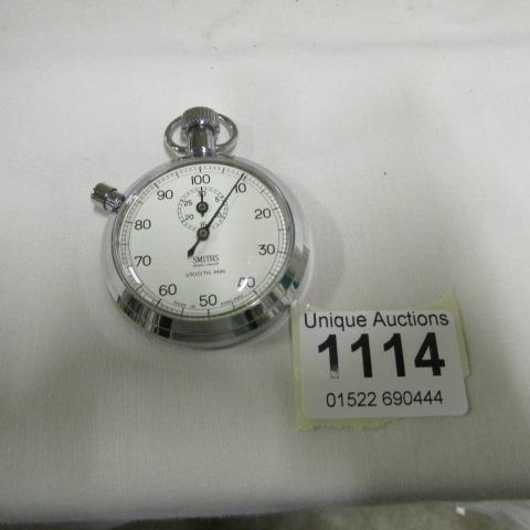 A Smith's 1/100 min. pocket watch stamped E.M.E.B 105 on back