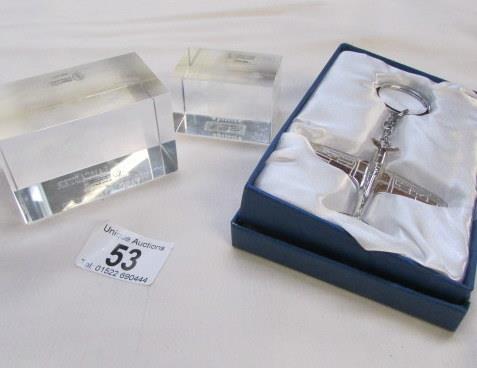 An official R.A.F Spitfire key ring and 2 Crystal Clear laser art aircraft paperweights