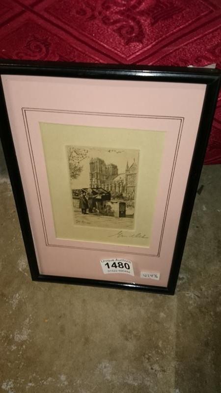 A framed and glazed circa 1928 etching 'Notre Dame Booksellers' signed in pencil Francois Gremillet