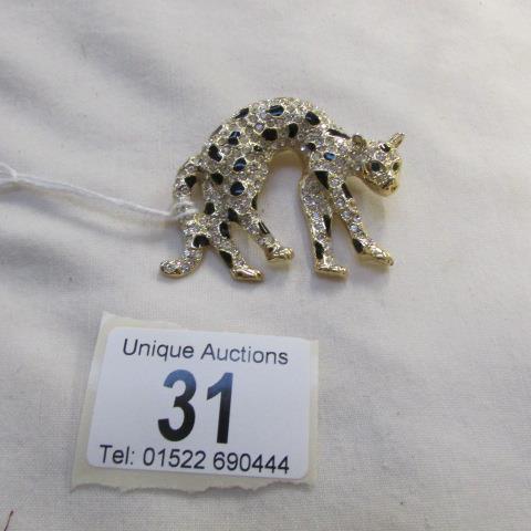 A jewelled leopard brooch