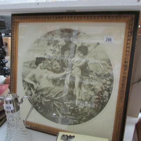 A framed and glazed circular engraving