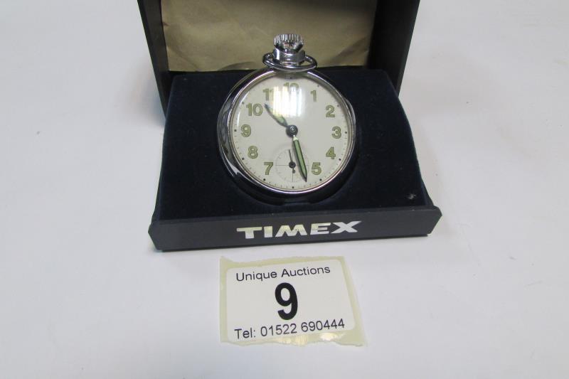 A Timex pocket watch in original box