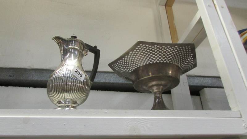 A silver plated footed bowl and a silver plated jug