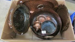 A quantity of copperware including pots and hammered plates