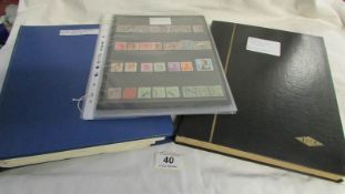 A GB stock book, an album of mint pre-decimal Elizabeth II Gb stamps and a quantity of British
