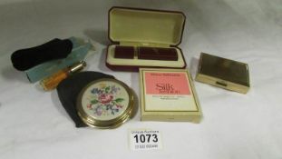 A mixed lot of compacts, perfume etc including musical compact