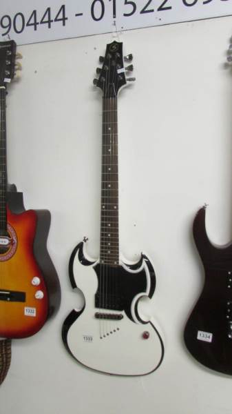A new 'Elvira' electric guitar with soft case