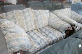 An oak framed sofa and chair