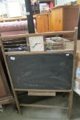 A vintage blackboard with clock and abacus