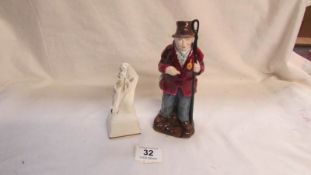 A Coalport figurine 'Horse Vendor' and a Royal Worcester horse head