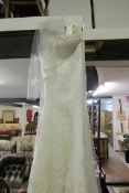 Wedding dress with gloves and veil