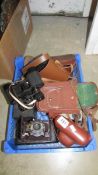 A mixed lot of binoculars and cameras etc