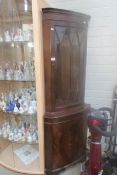 A good quality mahogany effect corner cabinet