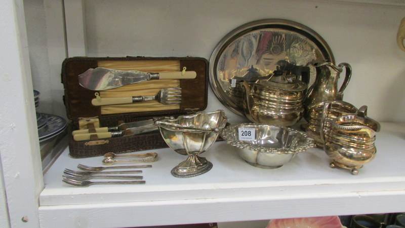 A quantity of silver plate including 2 piece tea set, fish servers etc