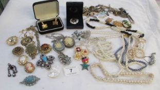 A mixed lot of jewellery including some silver