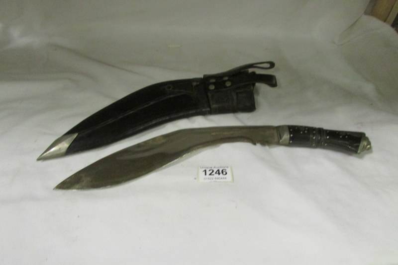 A Kukri with skinning knives