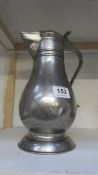 A large pewter jug